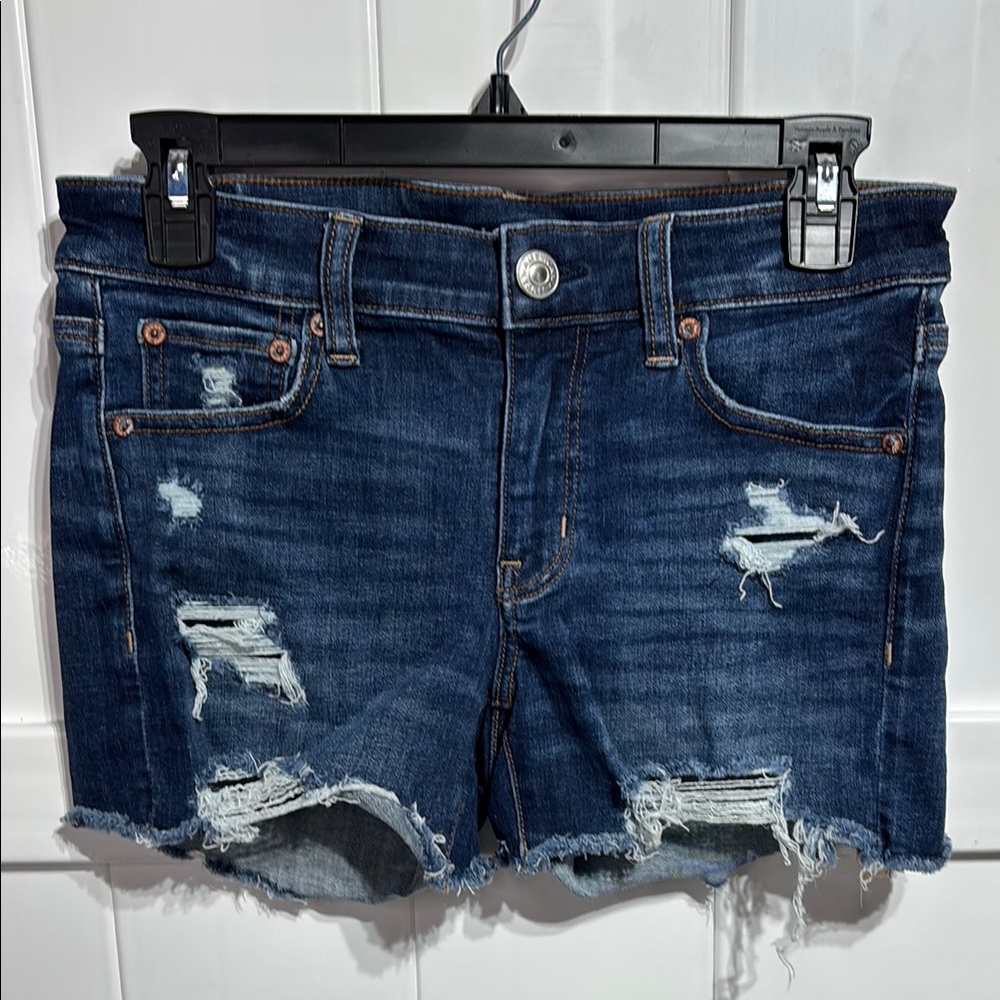 American Eagle midi distressed blue jean shorts